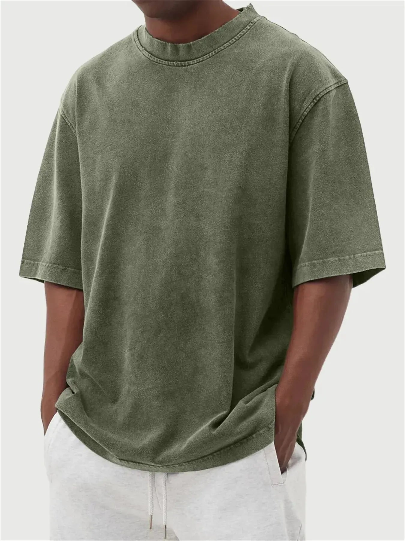 Men's stone washed distressed pullover t-shirt in loose fit with half sleeves available in eight colours