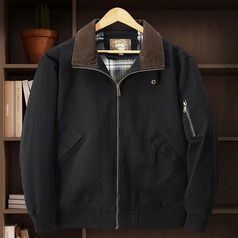 Men's washed cotton baseball flight jacket in beige, shown on a hanger.