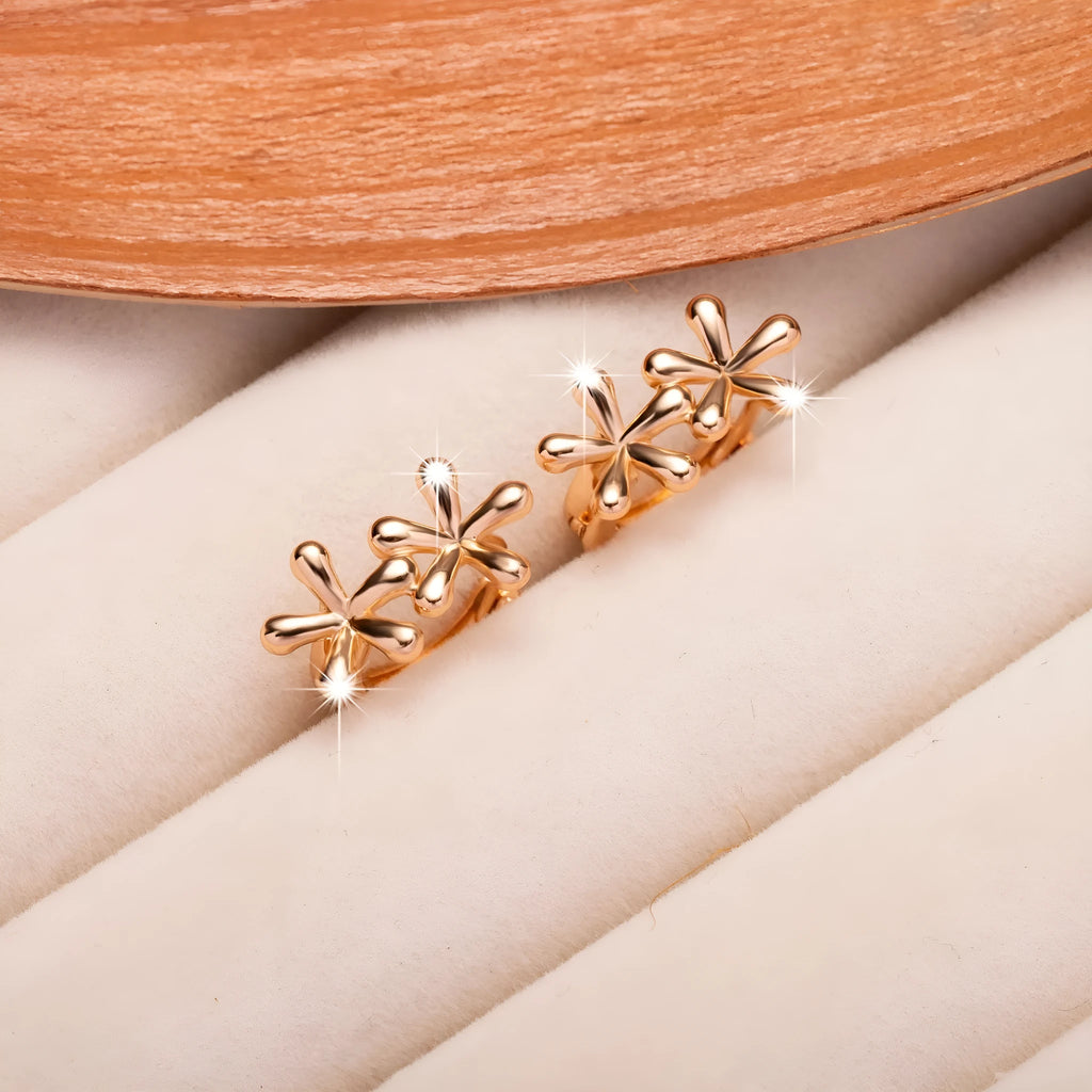 Circular rose gold earrings with waterdrop flower design for women