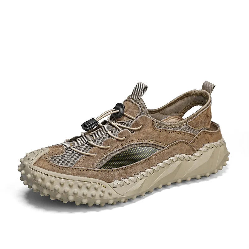 Men's black sports sandal with leather mesh upper, elastic band, and textured rubber sole.
