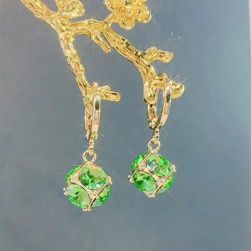 Women's zircon earrings with electroplated finish in geometric rose designs on copper
