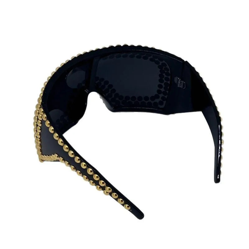 Men's punk sunglasses with large square frames and rivet detailing in silver or gold