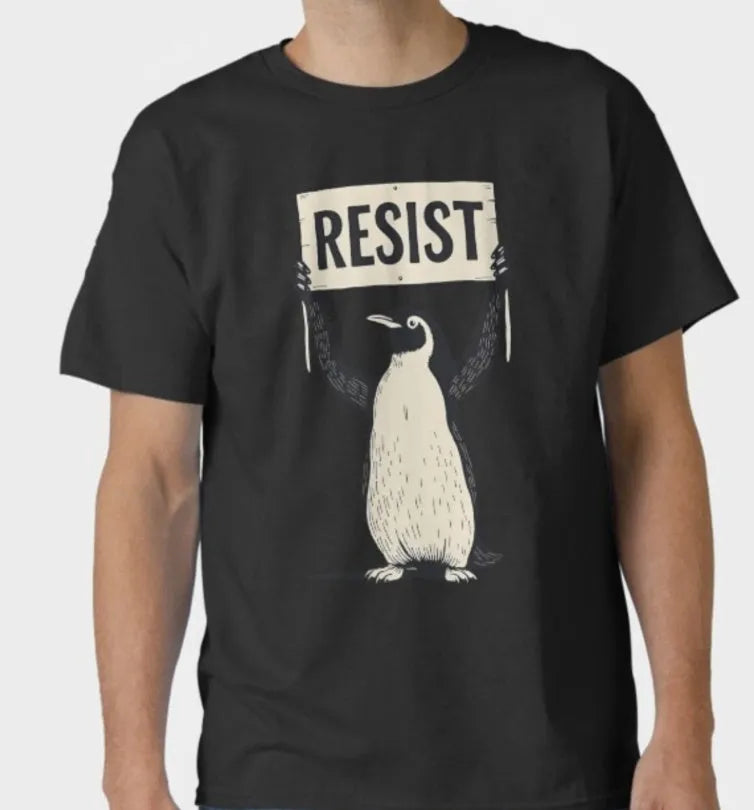 Unisex loose fit cotton short sleeve t-shirt in black, green, and white on a size chart.