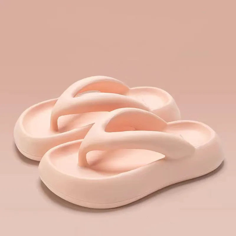 Solid colour EVA thong sandals with thick sole and a bow on the strap.