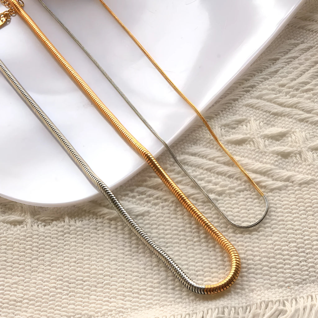 Women's stainless steel snake bones chain necklace with 3mm thickness and cold golden colour geometric design