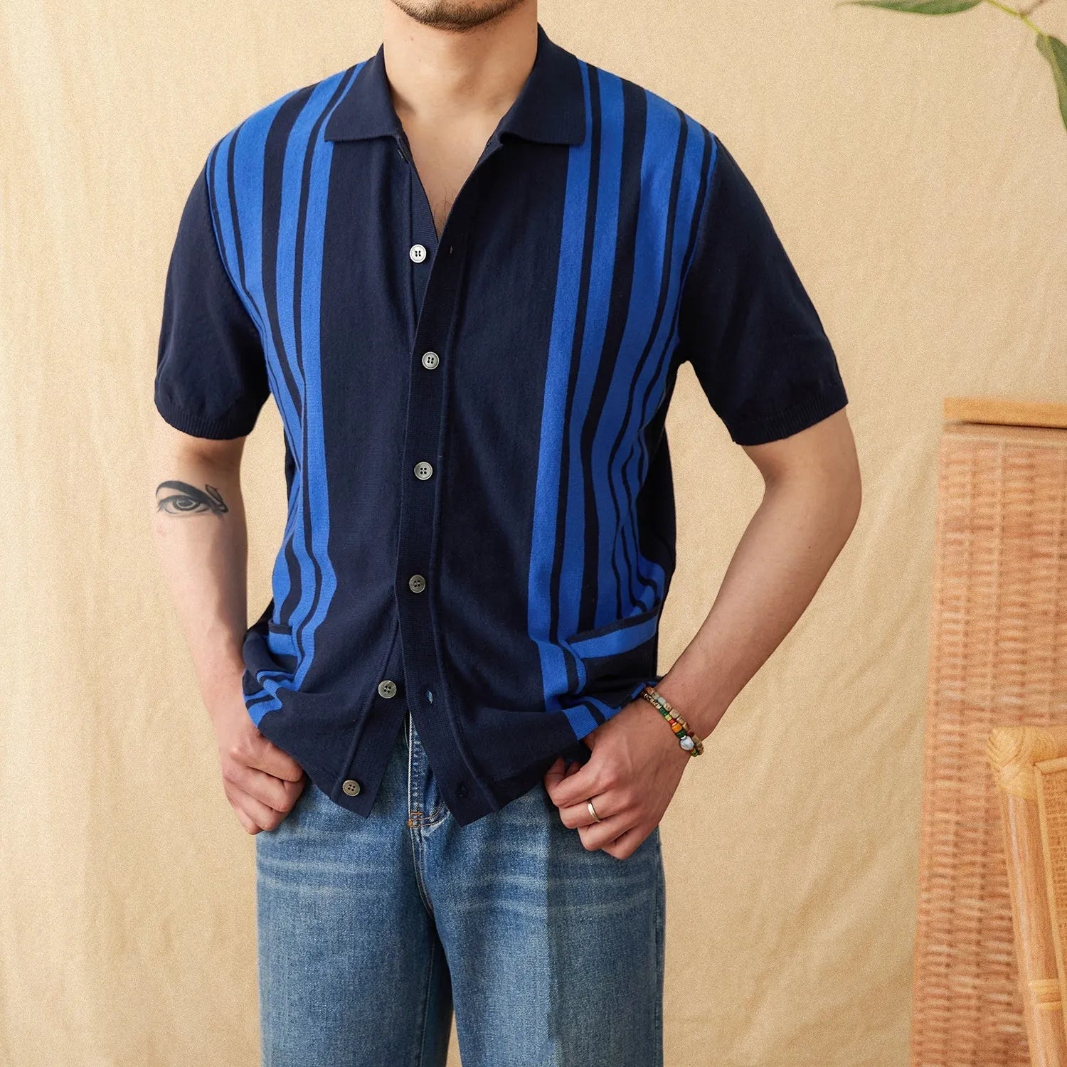 Striped knitted polo cardigan with lapel collar and short sleeves in cotton blend fabric