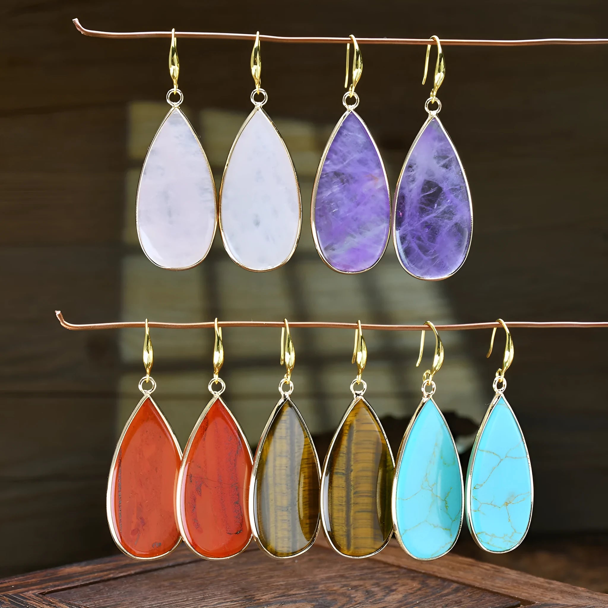 Vintage drop-shaped stone earrings in Tigereye, amethyst, pink crystal, Redstone, or turquoise colours.