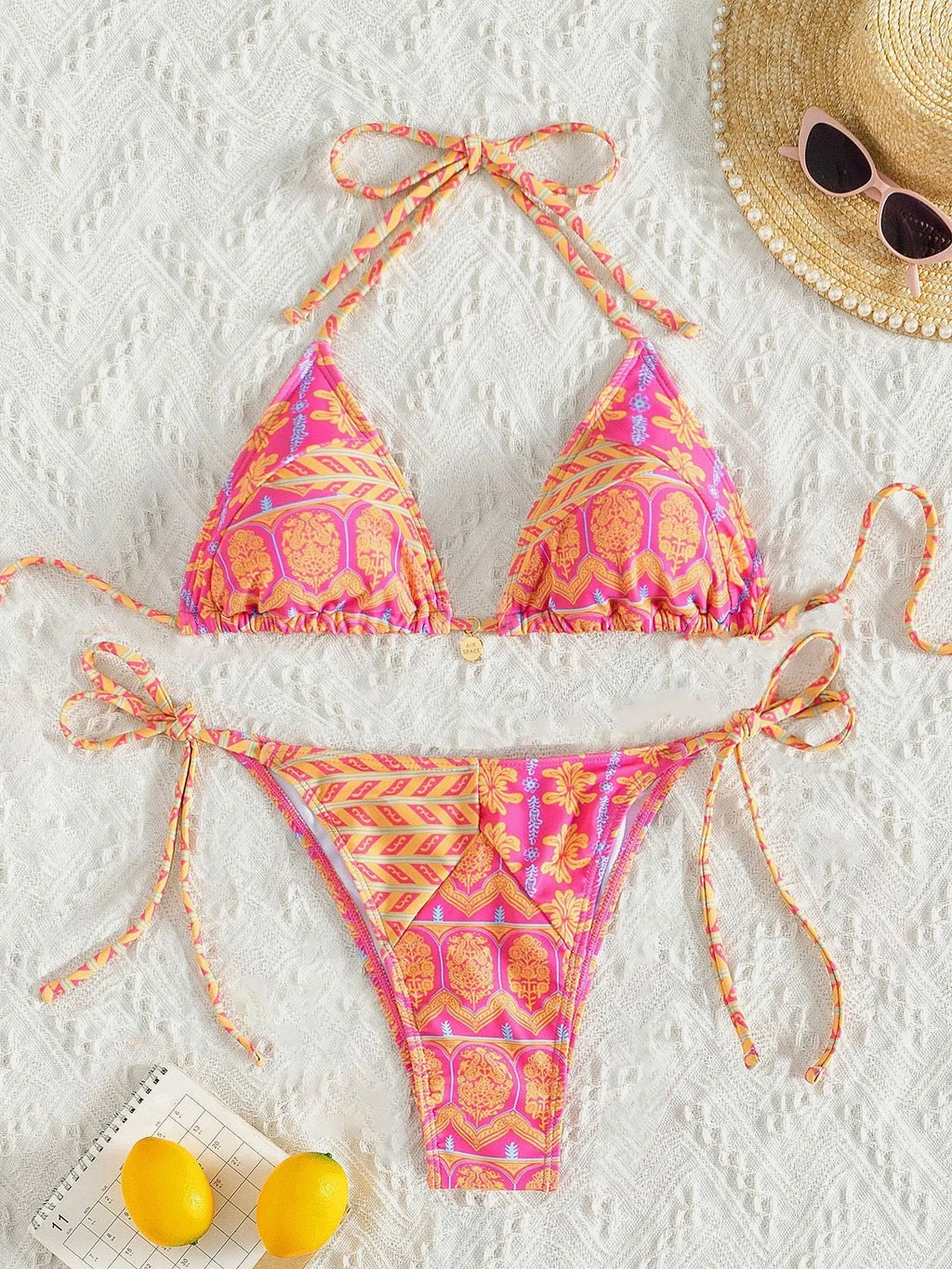 Women's split bandage bikini swimsuit with printed stitching details in various colours