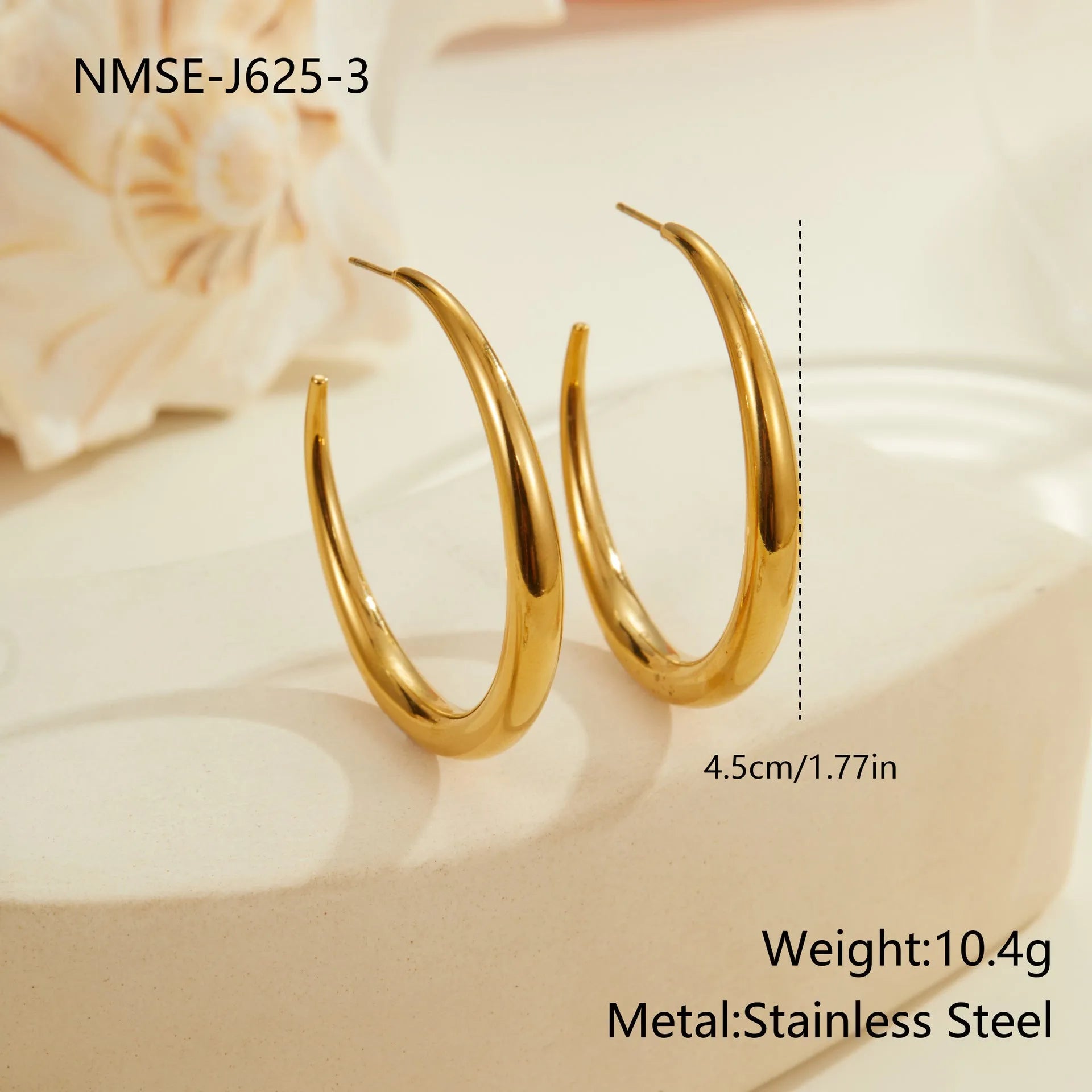 Titanium steel geometric hoop earrings with circular design and gold or steel finishes