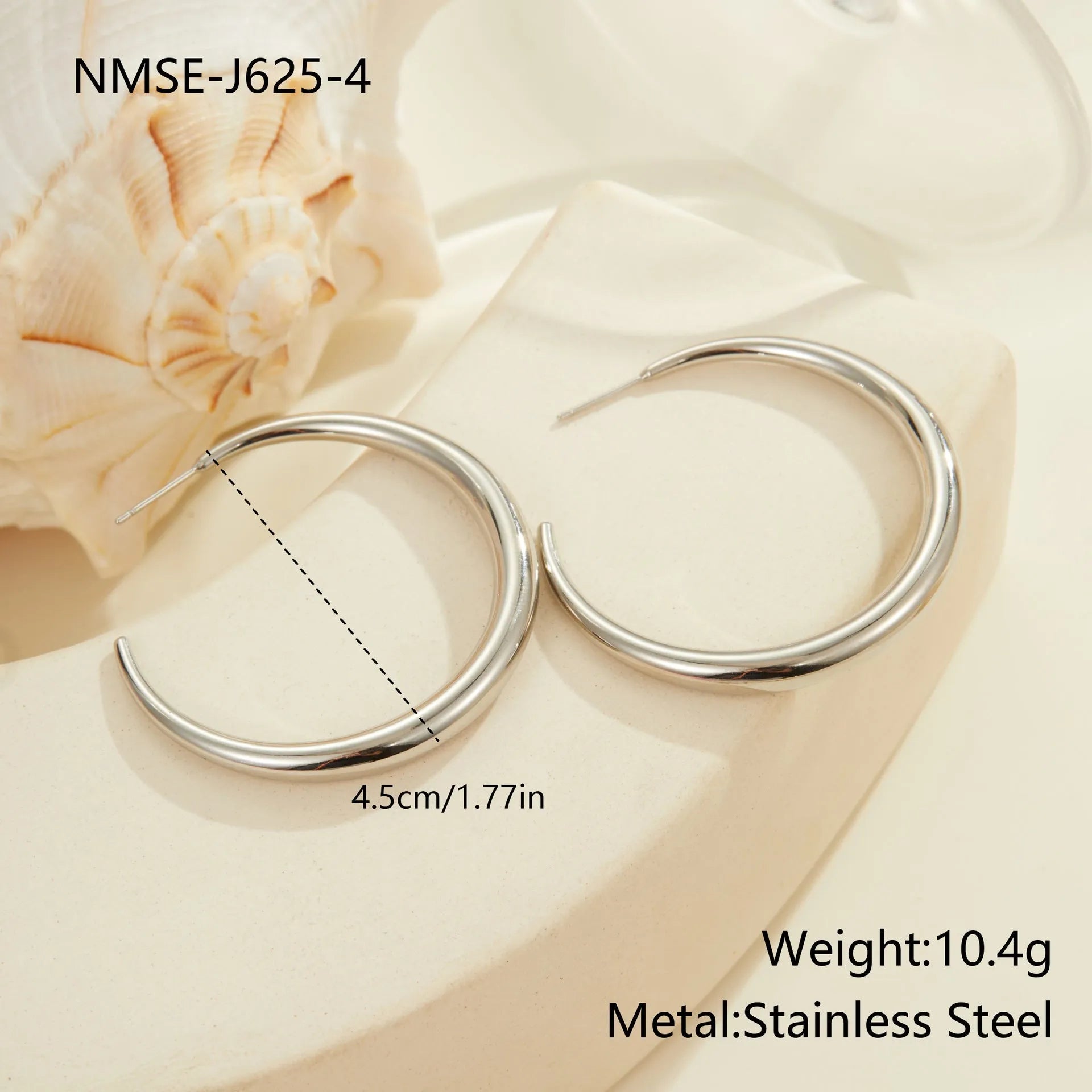 Titanium steel geometric hoop earrings with circular design and gold or steel finishes