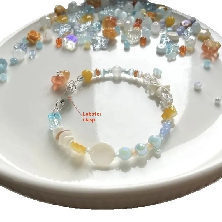 Orange water-soaked colour beach bracelet with diamond-shaped design and round elements