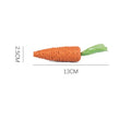Cat toys with paper carrot shapes containing ringing stones for dental care and interactive play