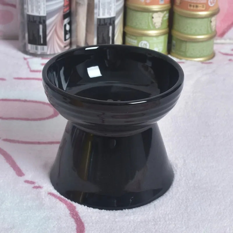 Ceramic pet bowl with anti-tumble design and raised chin support for cats and dogs