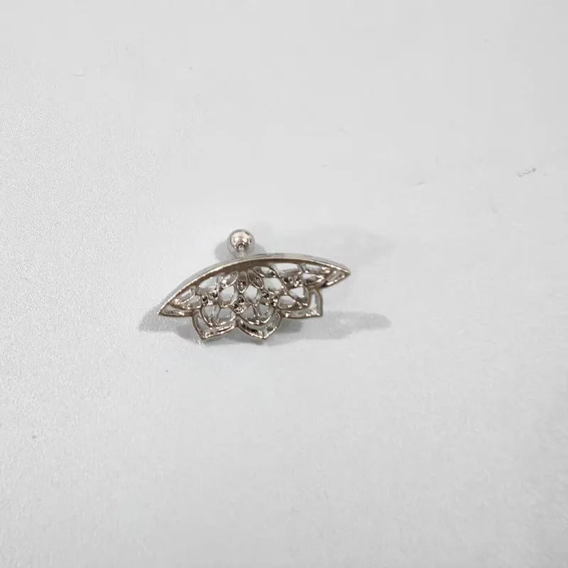 A pair of geometric spider web design stud earrings in an electroplated gold finish.