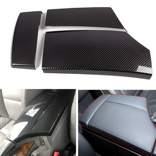 Three ABS armrest box protective covers with carbon fibre diagonal weave pattern showing polished shiny surface