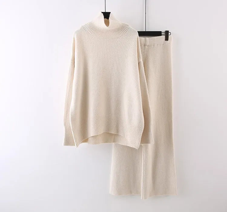 Women's solid colour sweater and wide leg trousers two-piece set in beige, shown as a coordinated outfit.
