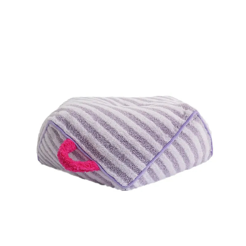 Striped soft velvet pet bed in yellow, orange, and purple colour options with a removable cover.