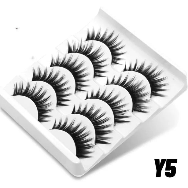 Box of natural false eyelashes showing six different thick, dense styles including Y5 and A01-A05 with glue