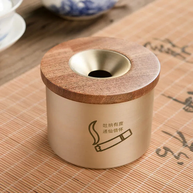 Retro-style solid copper ashtray with a wooden lid in black or red.