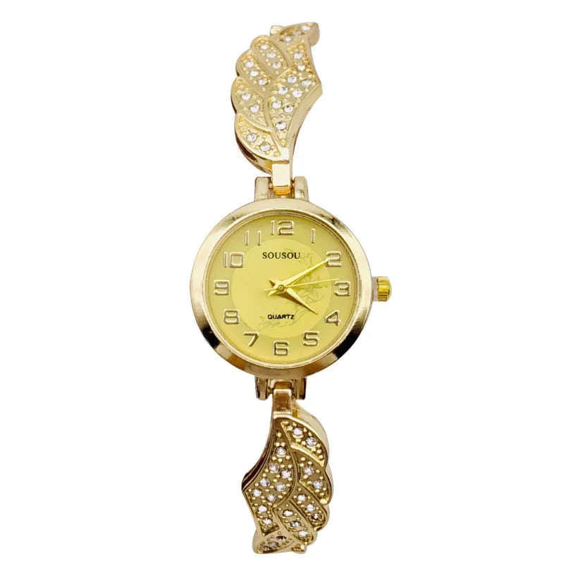 Women's stainless steel fashion watch with round gold dial and vachette clasp.
