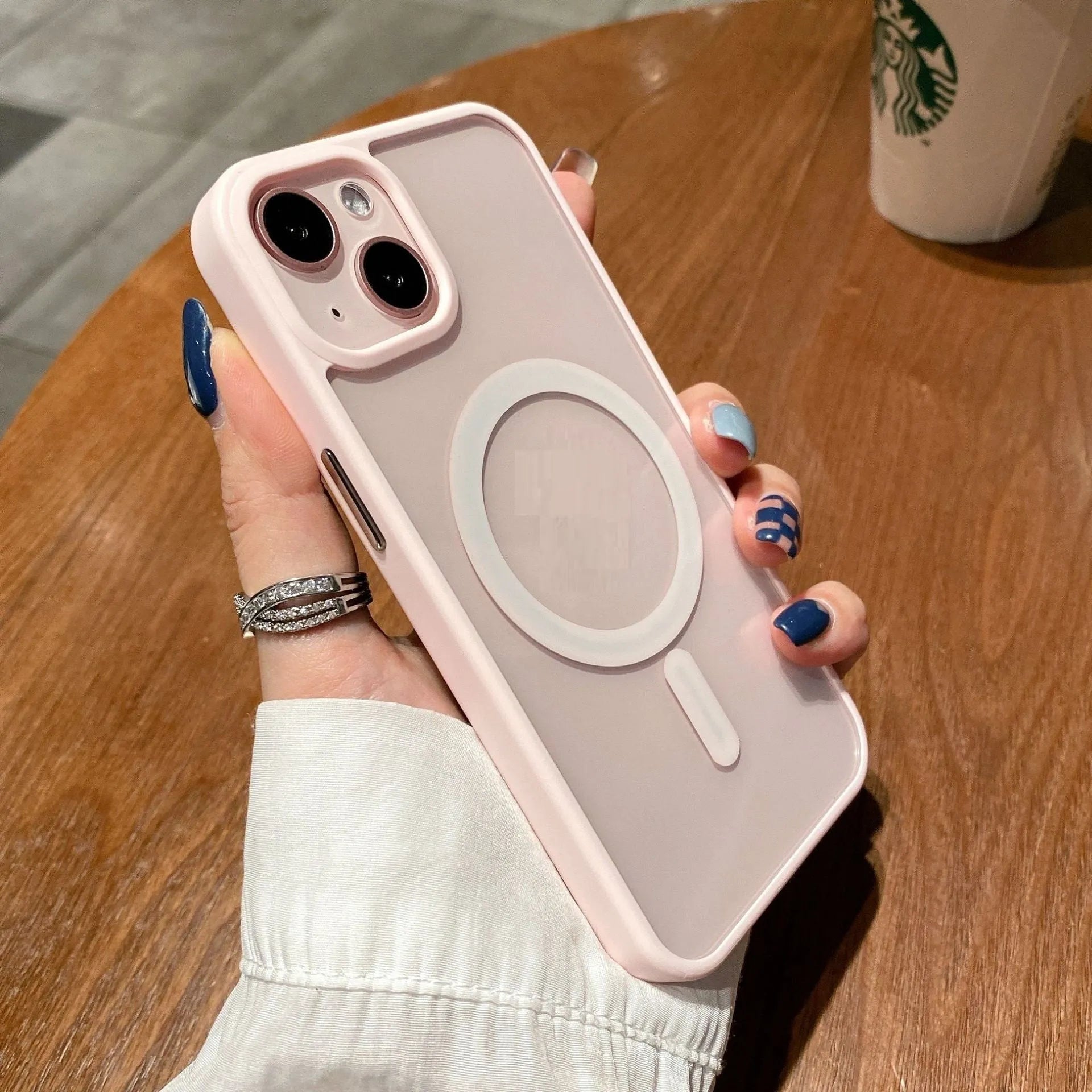 Transparent acrylic MagSafe phone case for iPhone showing magnetic ring and clear design