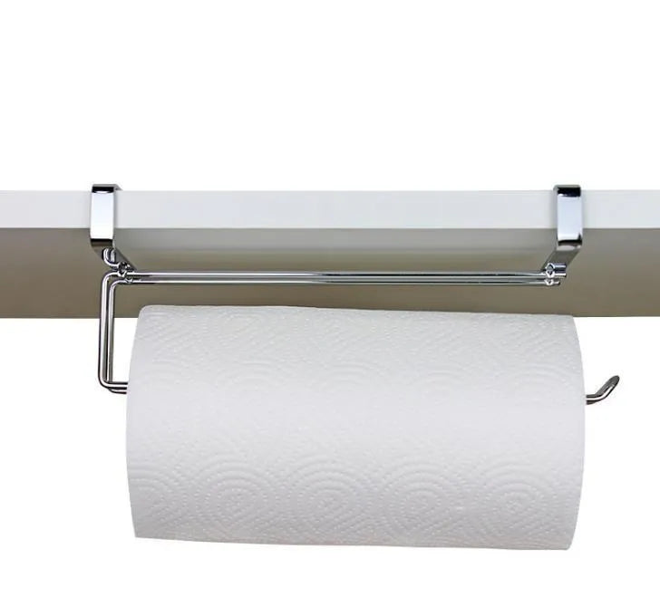 Silver stainless steel paper towel rack mounted on kitchen cabinet door