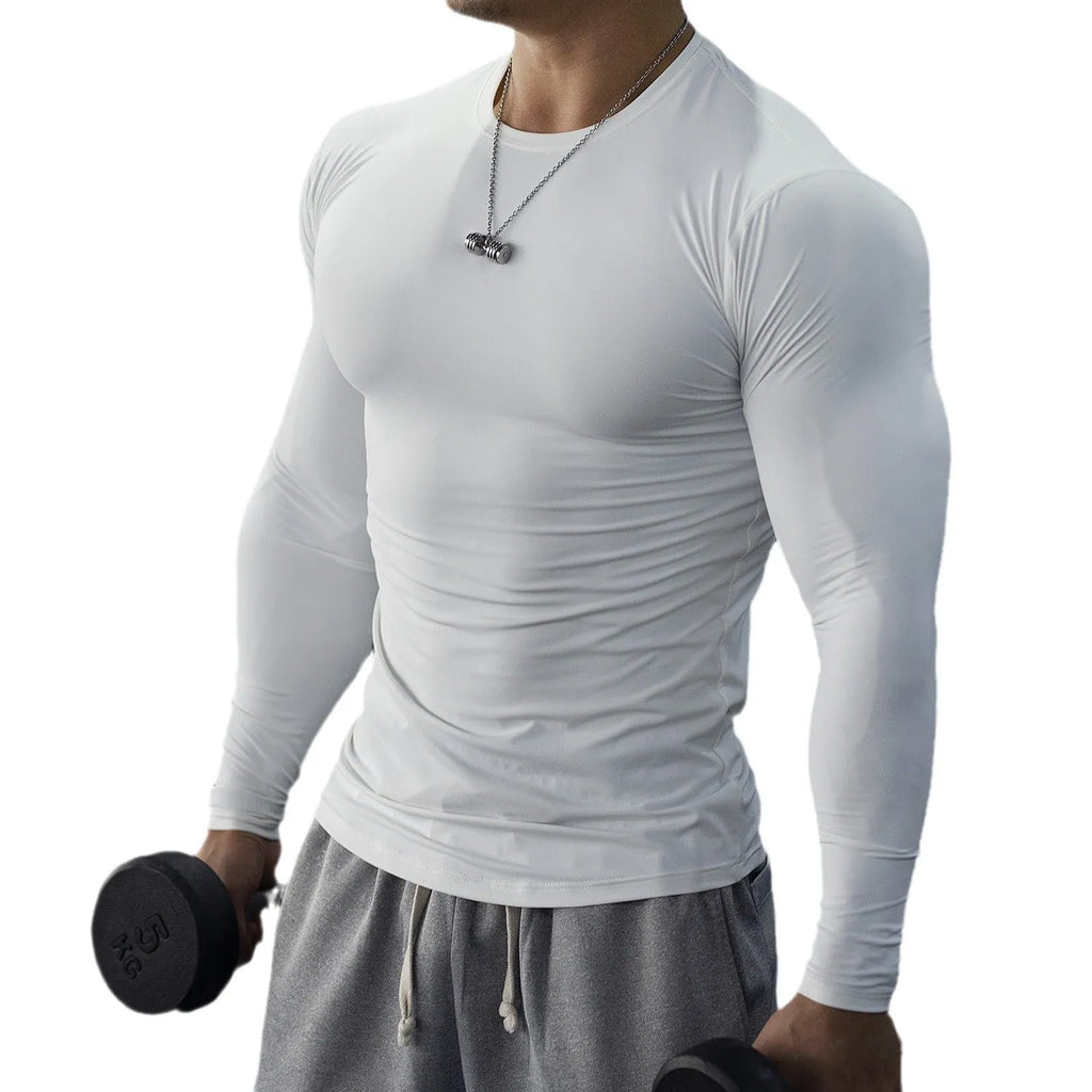 Man wearing black long-sleeved slim-fit fitness tights for gym workout or running.