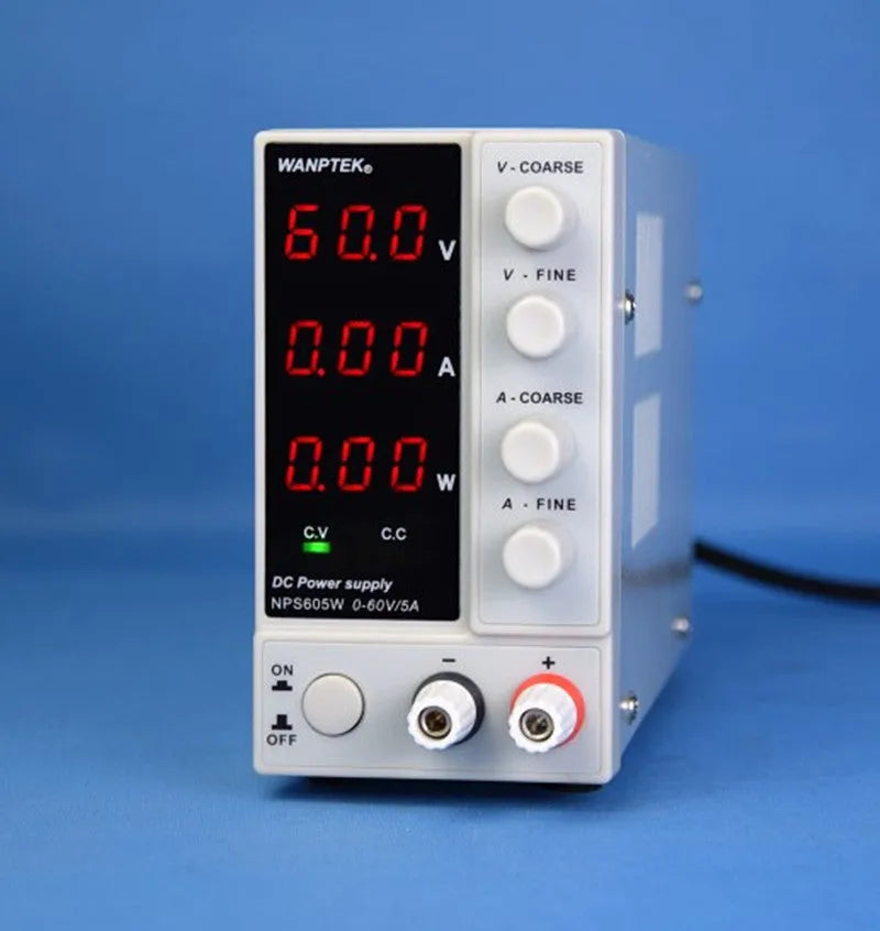 White adjustable DC bench power supply model NPS605W with voltage and current control dials.