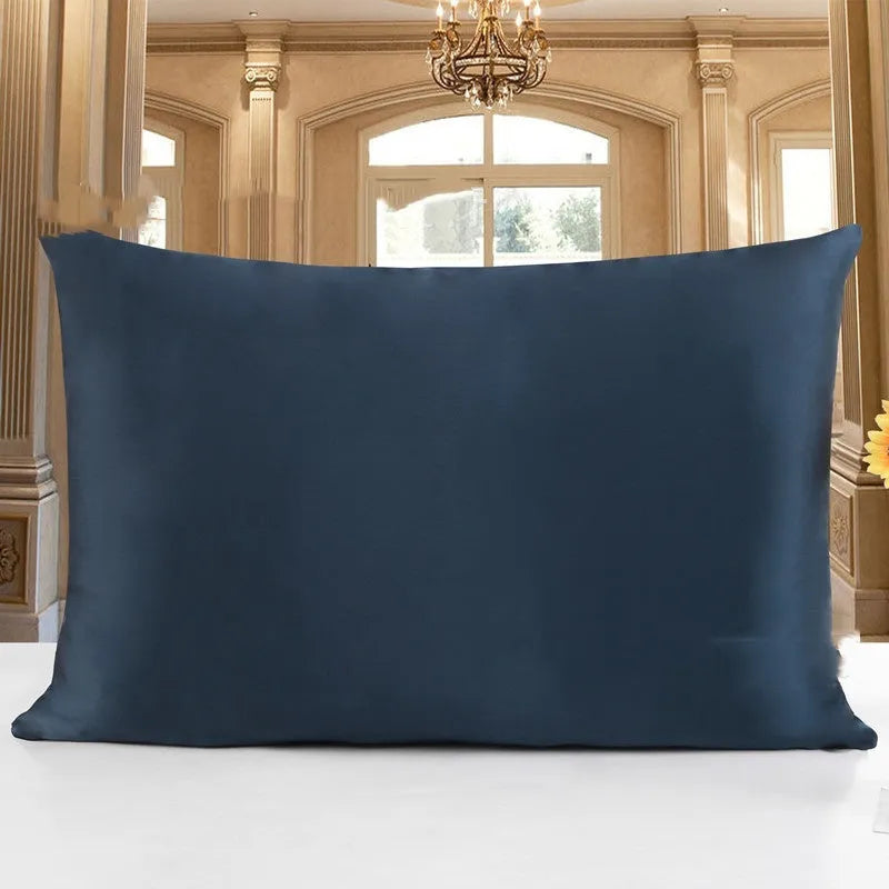 19 M double-sided silk pillowcase in apricot colour showing smooth texture and hem detail.