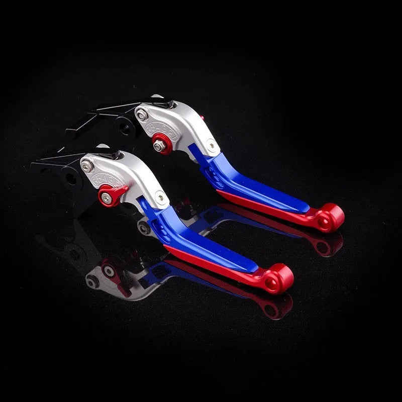 Pair of anodised metal motorcycle brake and clutch levers with adjustable length mechanism