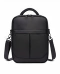 Black Oxford fabric men's messenger bag showing shoulder strap and structured shape