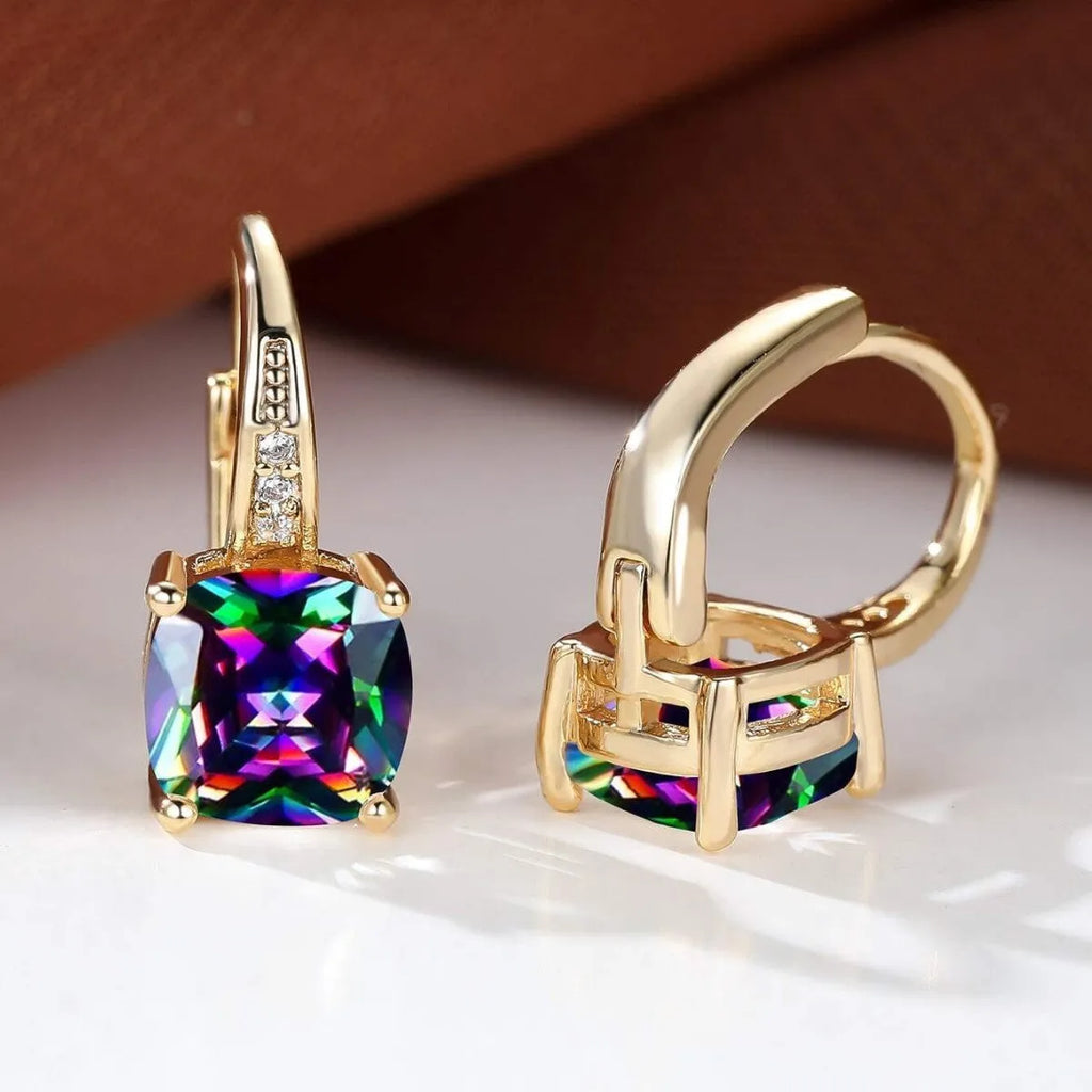 Square geometric ear clips with colourful moissanite stones in gold and silver electroplated finishes.