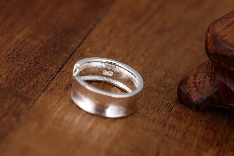 Sterling silver geometric open ring with frosted finish and adjustable opening