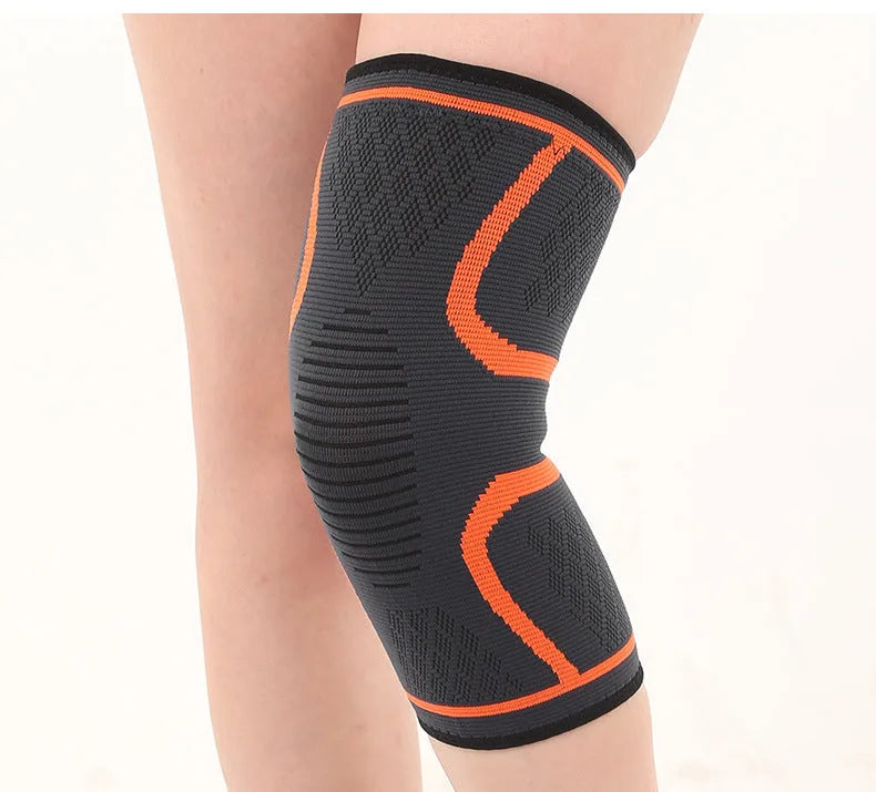 Stretch polyester sports kneepad with corrugated texture in black, shown on a knee.