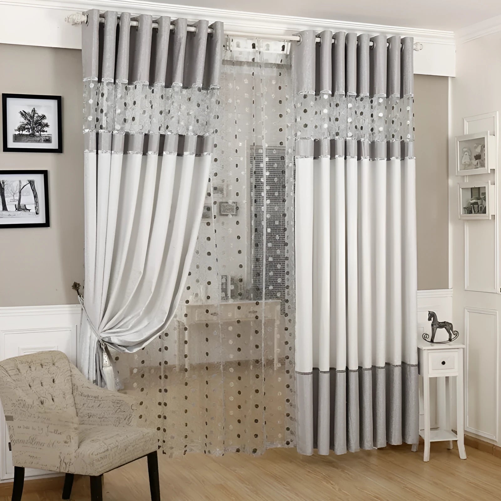 Simple blackout curtain panel hanging, showing light-blocking fabric and hook heading style.