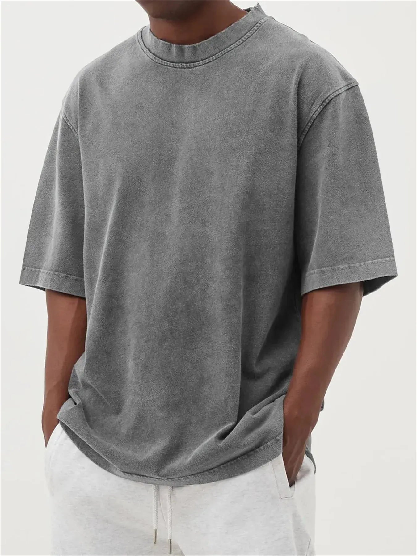 Men's stone washed distressed pullover t-shirt in loose fit with half sleeves available in eight colours
