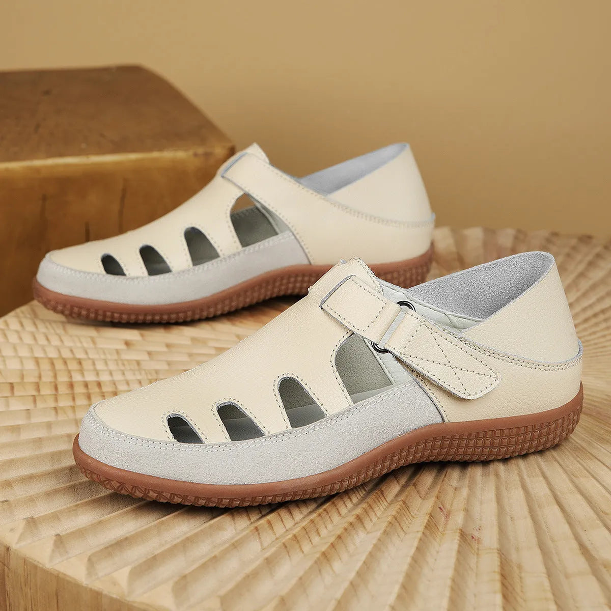 Plus size women's flat sandals in blue with hollow toe cap and thick rubber sole
