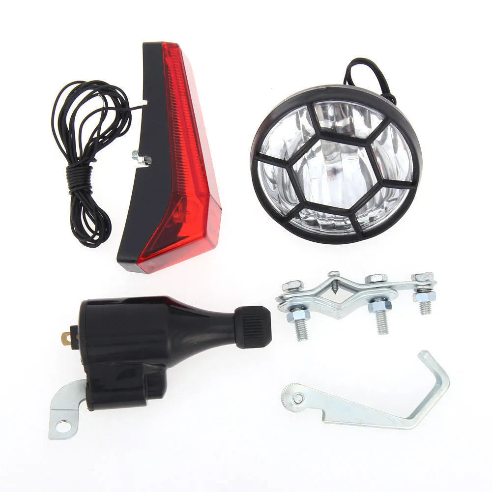 Silver bicycle dynamo light generator kit for front fork or rear frame mounting with friction power generation