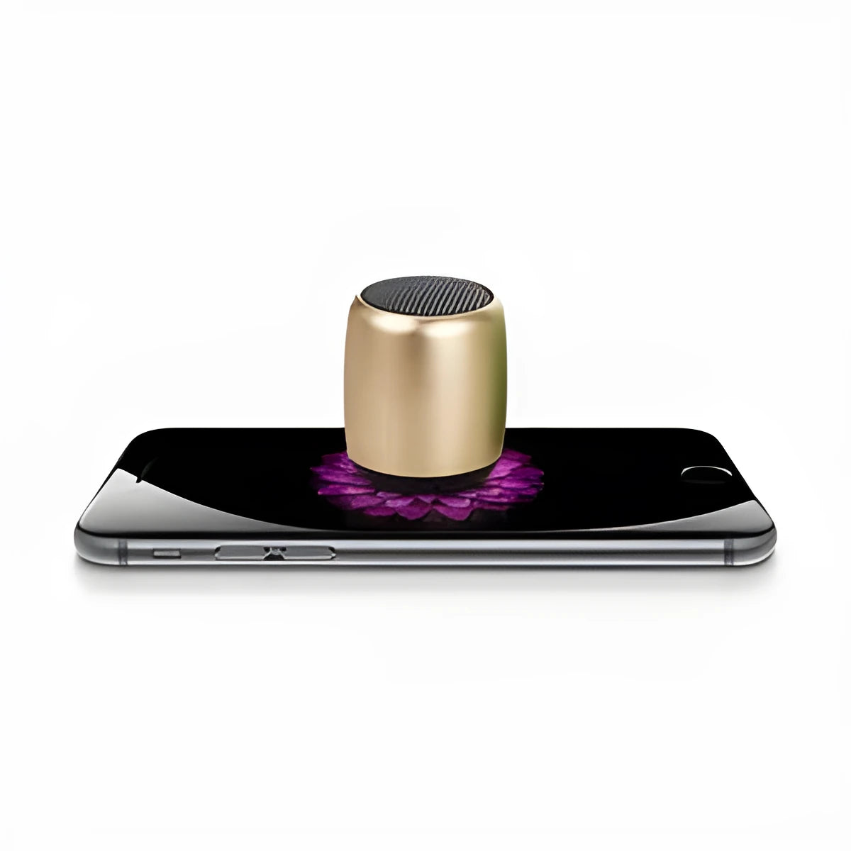 A compact portable Bluetooth mini speaker in black, blue, gold, or pink colour.
