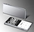Black portable MP3 player with 2.4 inch touchscreen displaying music playback interface