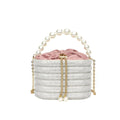 Women's retro style crossbody handbag with beaded pearl details on soft PU leather in a choice of colours.