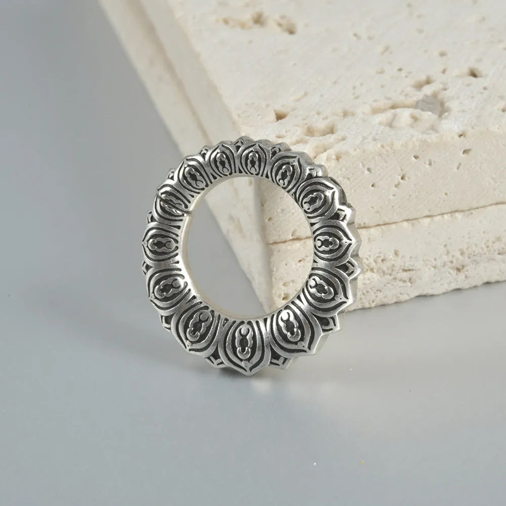 Retro hollow heart and lotus magnetic earrings in antique silver and gold finishes