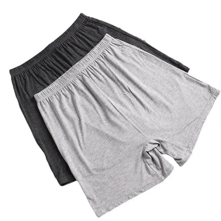 Men's solid colour modal boxer shorts on a white background, showing high waist design.