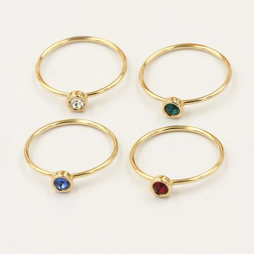 Women's knuckle ring with 14K gilded finish and zircon stone in choice of four colours