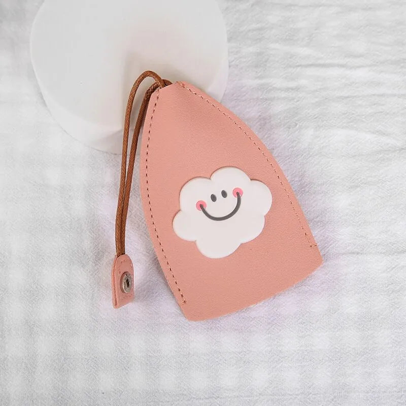 Cartoon pull-out car key case in PU leather with colourful designs measuring 14 x 7.5 cm