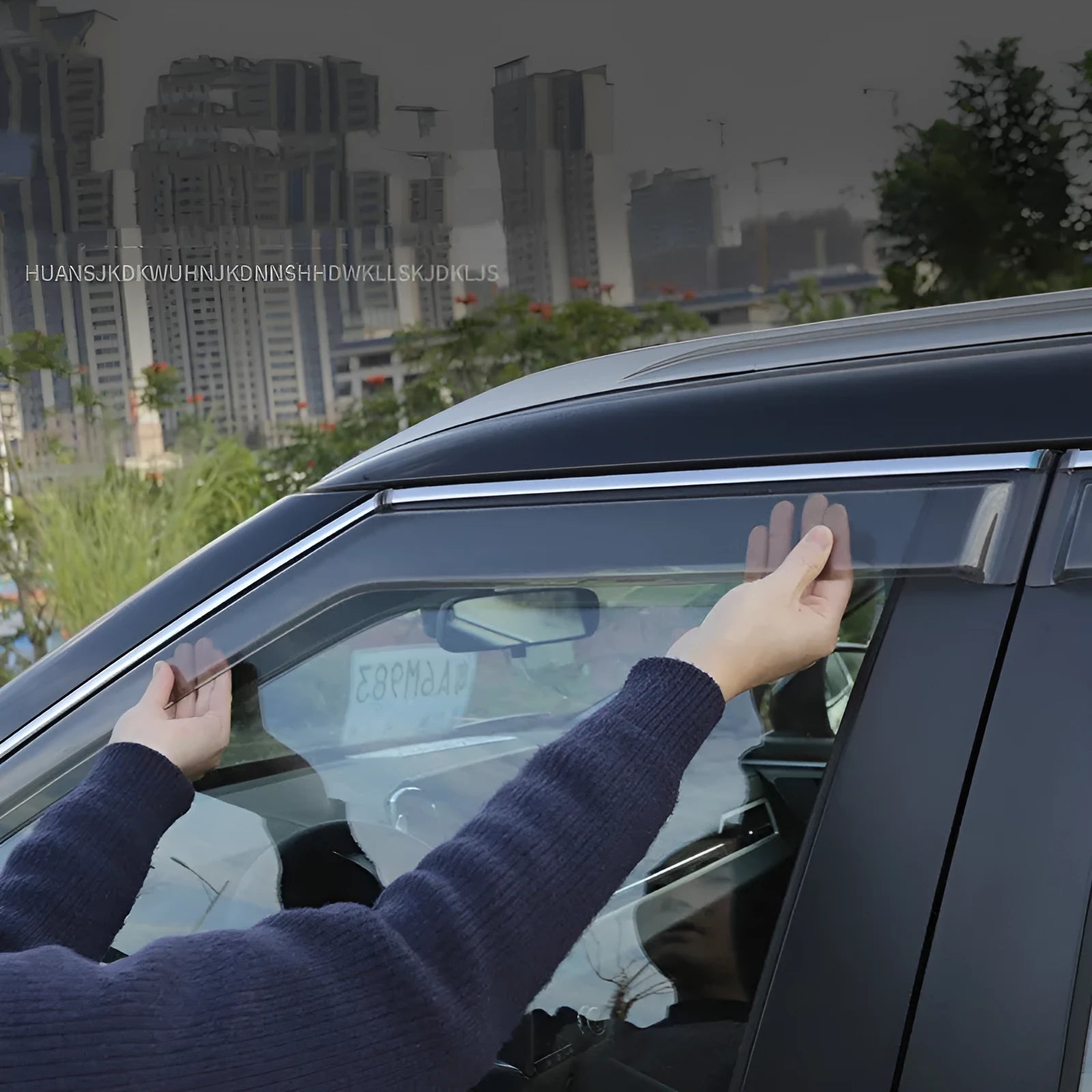 2023 Mitsubishi Outlander black and translucent window deflectors installed on vehicle exterior