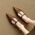 Brown women's pointed toe flat shoes with cowhide leather upper and metal detail