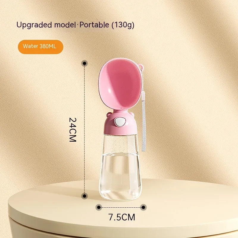 Portable dog water bottle with integrated food container in brown, pink, or yellow colours
