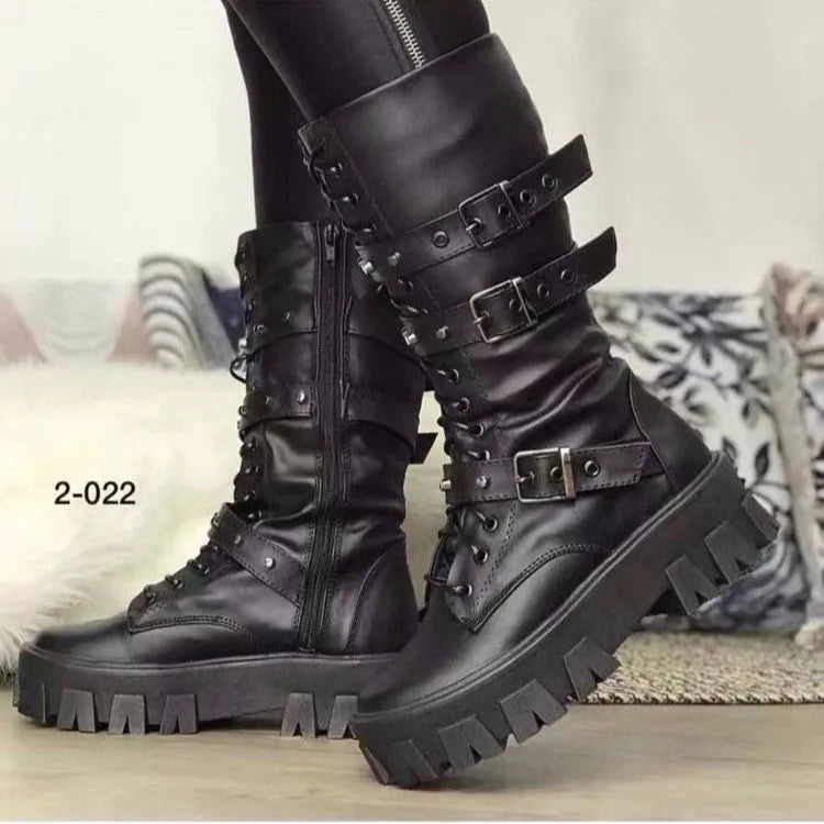 Black women's mid-calf boots with metal buckle detail and a side zip fastening.