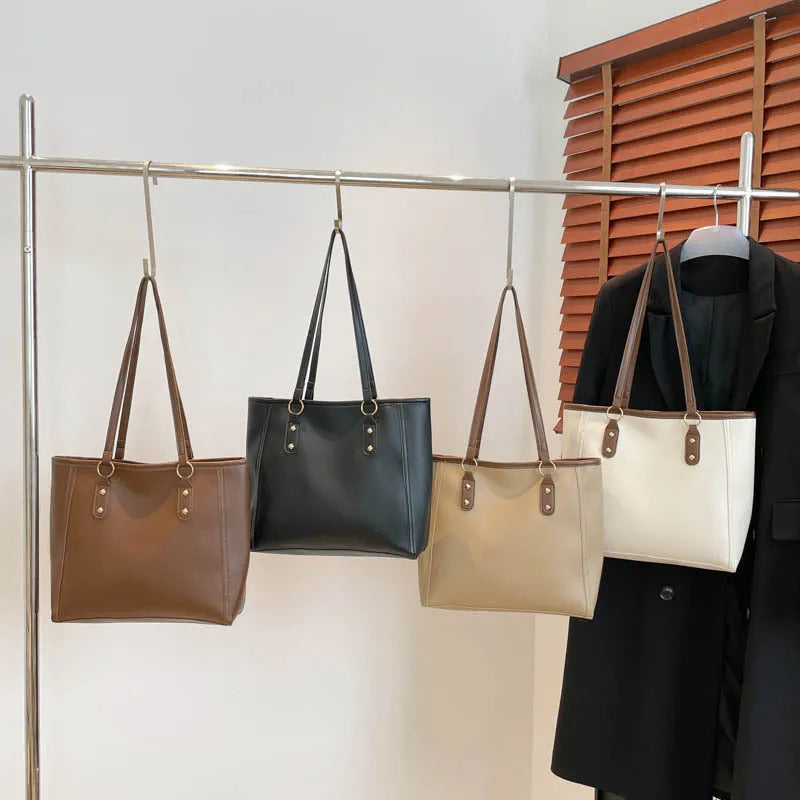 PU leather tote bag with contrast colour trim and internal mobile phone and document compartments